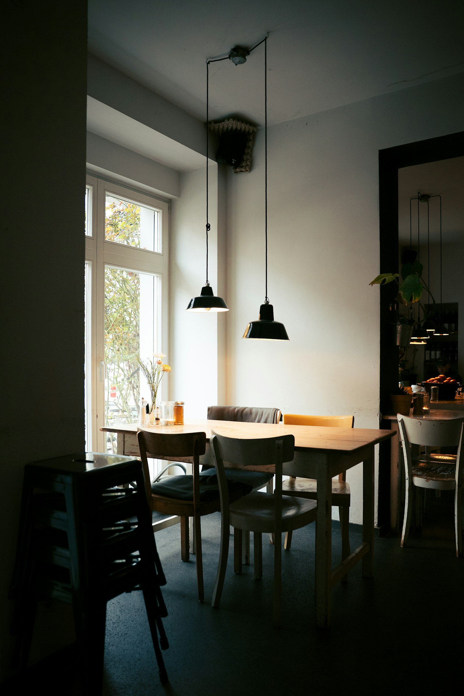 Naturally lit café with wooden tables