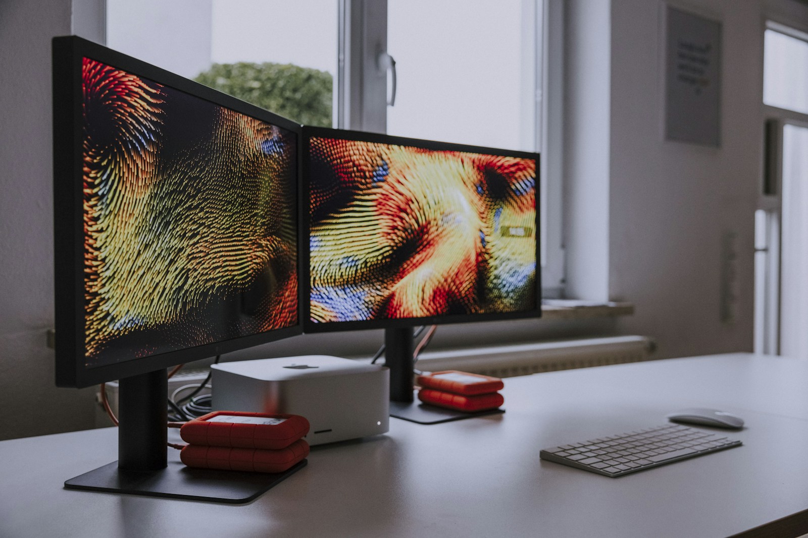 Creative workspace with two monitors